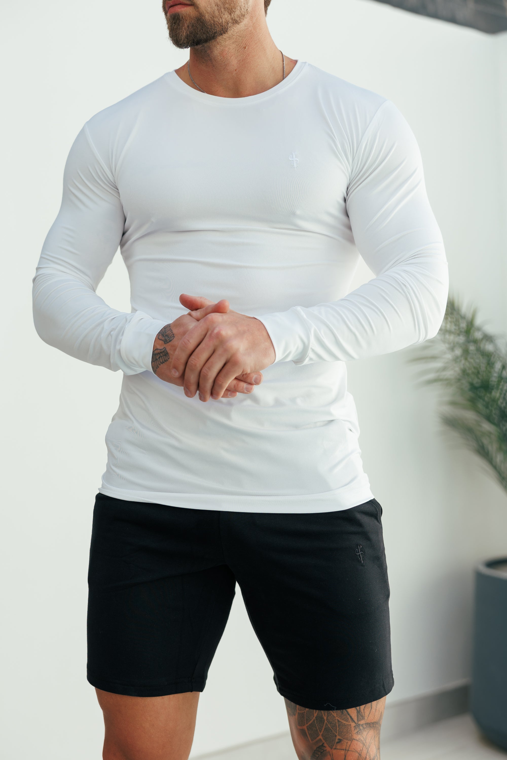 Muskelbetontes, langärmeliges, weißes Gym-Top mit Rundhalsausschnitt - FSH885